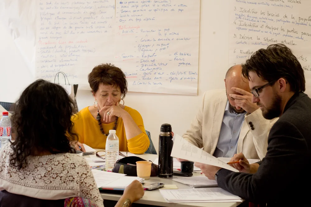 Experienced professionals working through a case during a Bioforce learning session